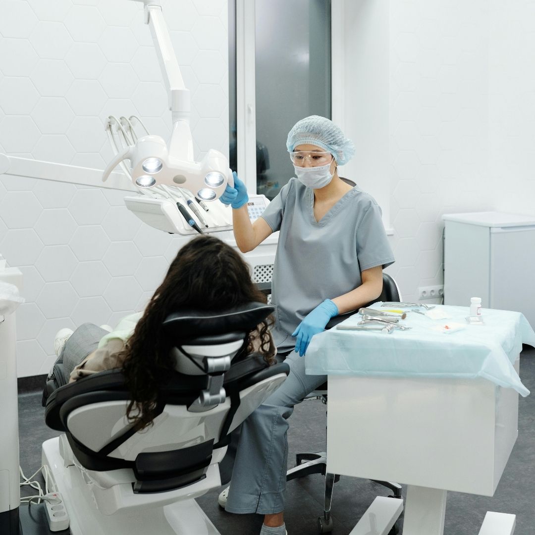 dentist helping a patient