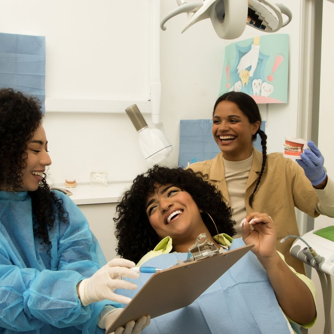 female dental patient with dentist